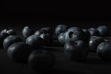 Closeup shot of many blueberries one on another