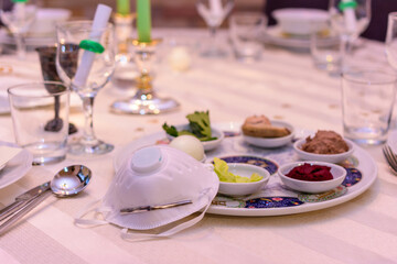 Small Jewish Passover Seder dinner in the Covid-19 Corona era