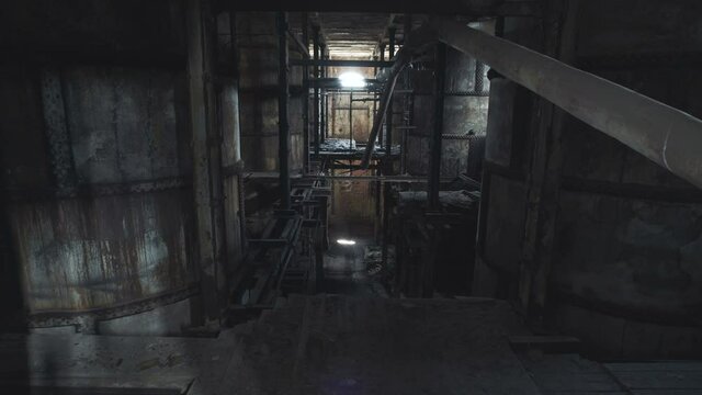 Gloomy boiler room of the old factory. Abandoned German pulp mill.