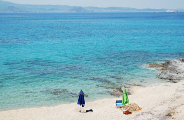 Naxos island Greece. Mikri Viglia village. Deserted, beautiful  white sand beach by the turquoise blue sea. Idyllic destination.  Copy space.
