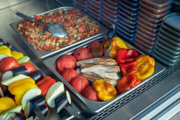 fresh and baked vegetables on the grill