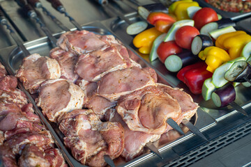 pieces of juicy pork and vegetables prepared for grilling