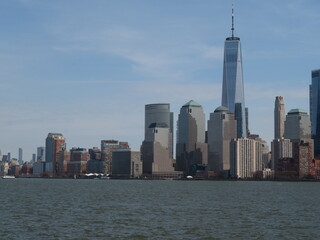 Obraz premium Skyline and modern office buildings of Midtown Manhattan viewed from across the Hudson River. 