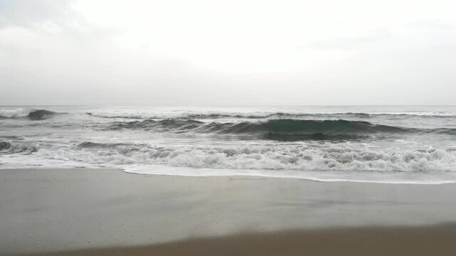 Drone footage of Beach waves coming onto shore of Tranquebar Tamil Nadu Chennai