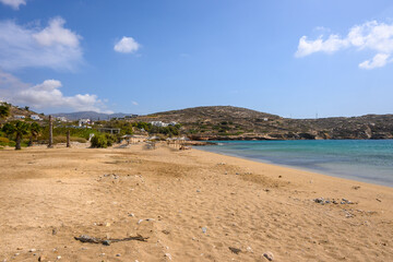 Koumpara beach with golden sand and white pebbles on Ios Island. Greece