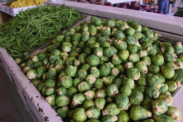 Image of brussel sprouts and green beans at a Farmer's Market