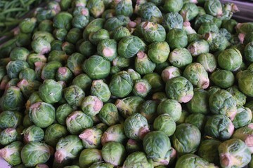 Fototapeta na wymiar Up-close image of brussel sprouts at a Farmer's Market