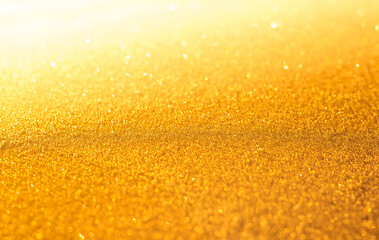 Golden sparkling festive background. Abstract Christmas for card or invitation.