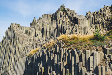 Mansion Rock. Rock formation natural monument Basalt organ. Polygonal structures in Panska skala, Kamenicky Senov, Czech Republic.