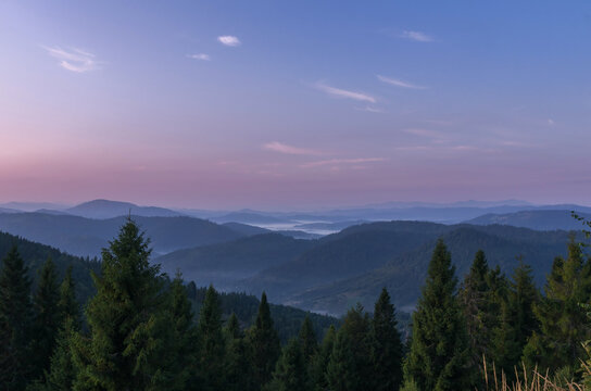 Sunrise over Carpathians. Beautiful dawn above tranquil mountain landscape. Image of attractive summer scene, nature wallpapers. Discovery the beauty of Earth. © Kseniia