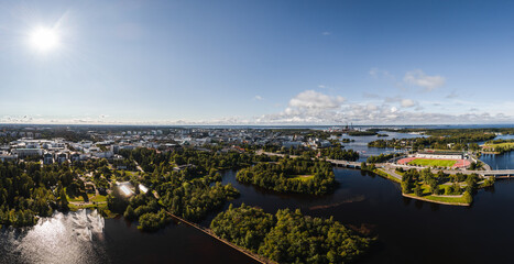 Panoramic view of city of Oulu in Finland seen from the air on a sunny day - 395979077