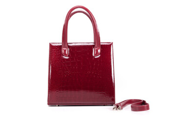 red stylish ladies leather bag on a white background