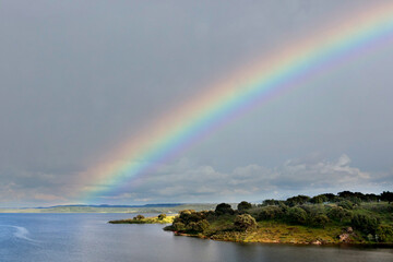 Fototapeta na wymiar Nice view with an amazing rainbow