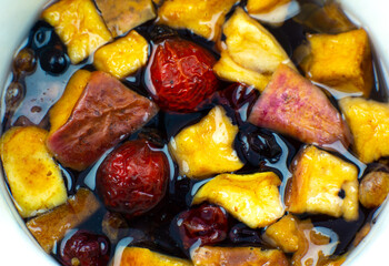 Herbal tea with dry fruits. Healthy drink in cold weather.