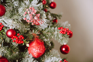 Christmas Tree with Red Balls and Stars. Winter Holiday Background.