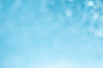 White light blue glitter bokeh texture abstract background