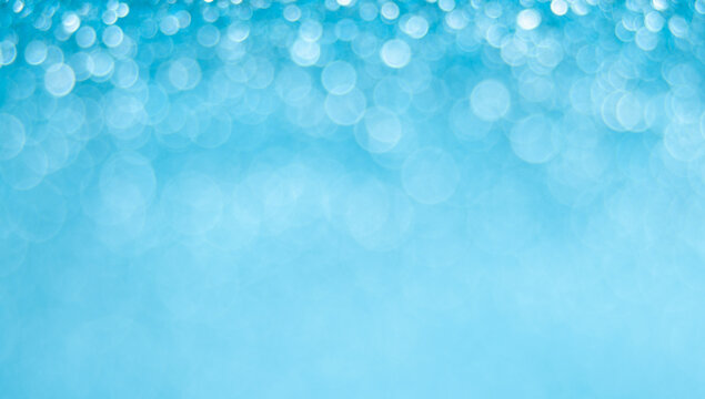 White light blue glitter bokeh texture abstract background