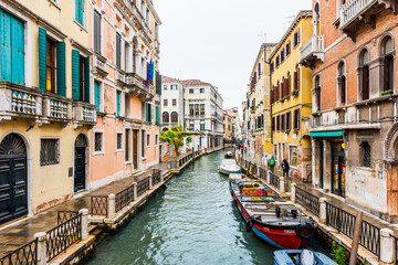 Venice canal and traditional colorful Venetian houses view. Classical Venice skyline. Venice, Italy.