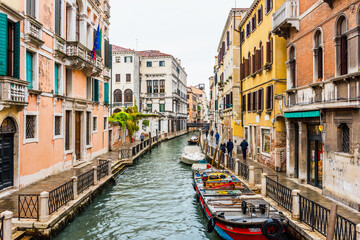 Fototapeta na wymiar Venice canal and traditional colorful Venetian houses view. Classical Venice skyline. Venice, Italy.