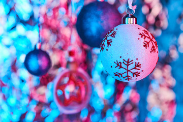 Nice Christmas toy ball with red snowflakes and other spherical decorations
