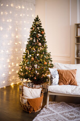New Year's holiday or celebration, the mood, Stylish Christmas minimalistic interior, Presents and wrapped gifts under the Christmas tree. large white living room with a vintage sofa