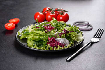 Fresh delicious vegitarian salad of chopped vegetables on a plate