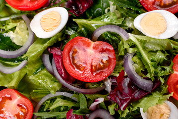 Fresh delicious vegitarian salad of chopped vegetables on a plate