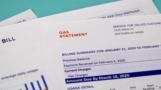 Communal payments. Utility statement, Energy statement, Gas statement and Electricity bill, close-up. Horizontal camera movement