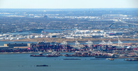 A view of Port Liberty and a full container ship in the New York Harbor in Bayonne New Jersey.