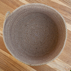 Fototapeta na wymiar top view knitted basket or knitted pot on the table