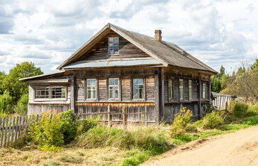 Old abandoned rural wooden house in russian village