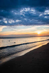 beautiful, mystical sunrise over the calm sea