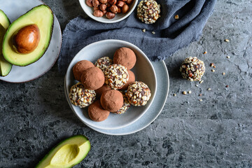 Chocolate avocado truffles with chopped hazelnuts