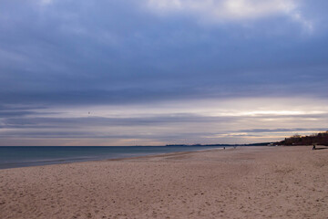 beautiful calm sea waving in the early morning on a golden sandy beach