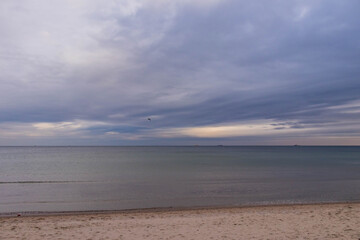 beautiful calm sea waving in the early morning on a golden sandy beach