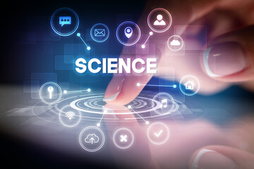 Finger touching tablet with web technology icons and SCIENCE inscription, web technology concept