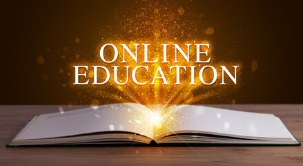 ONLINE EDUCATION inscription coming out from an open book, educational concept
