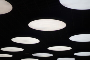 White circles on a black background. Abstract background. 