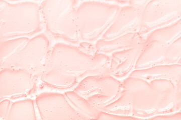 Liquid gel cosmetic smudge red pink texture background 