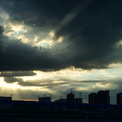 time clouds over city