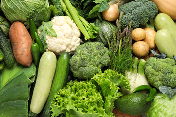 Different fresh vegetables as background, closeup view