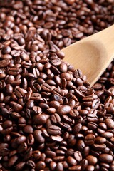 Coffee beans with a scoop