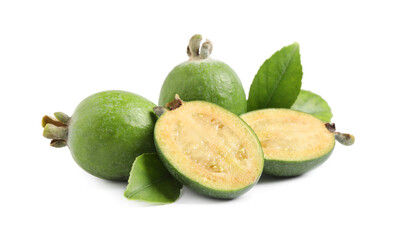Whole and cut feijoa fruits on white background