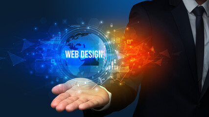 Elegant hand holding WEB DESIGN inscription, digital technology concept