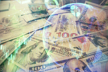 Multi exposure of forex chart drawing over us dollars bill background. Concept of financial success...