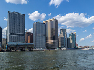 Sunny view of skyscrapers in Financial District, Manhattan from Hudson River