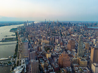 Fototapeta premium Aerial view of Manhattan New York City cityscape before sunset, view from One World Trade Center facing north