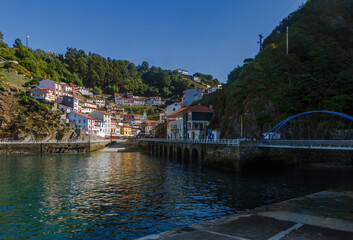 Coastal and tourist town of Cudillero with terraced houses. North of Spain fishing village