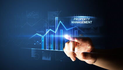 Hand touching PROPERTY MANAGEMENT button, business concept
