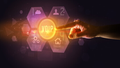 Hand touching VOIP inscription, new technology concept